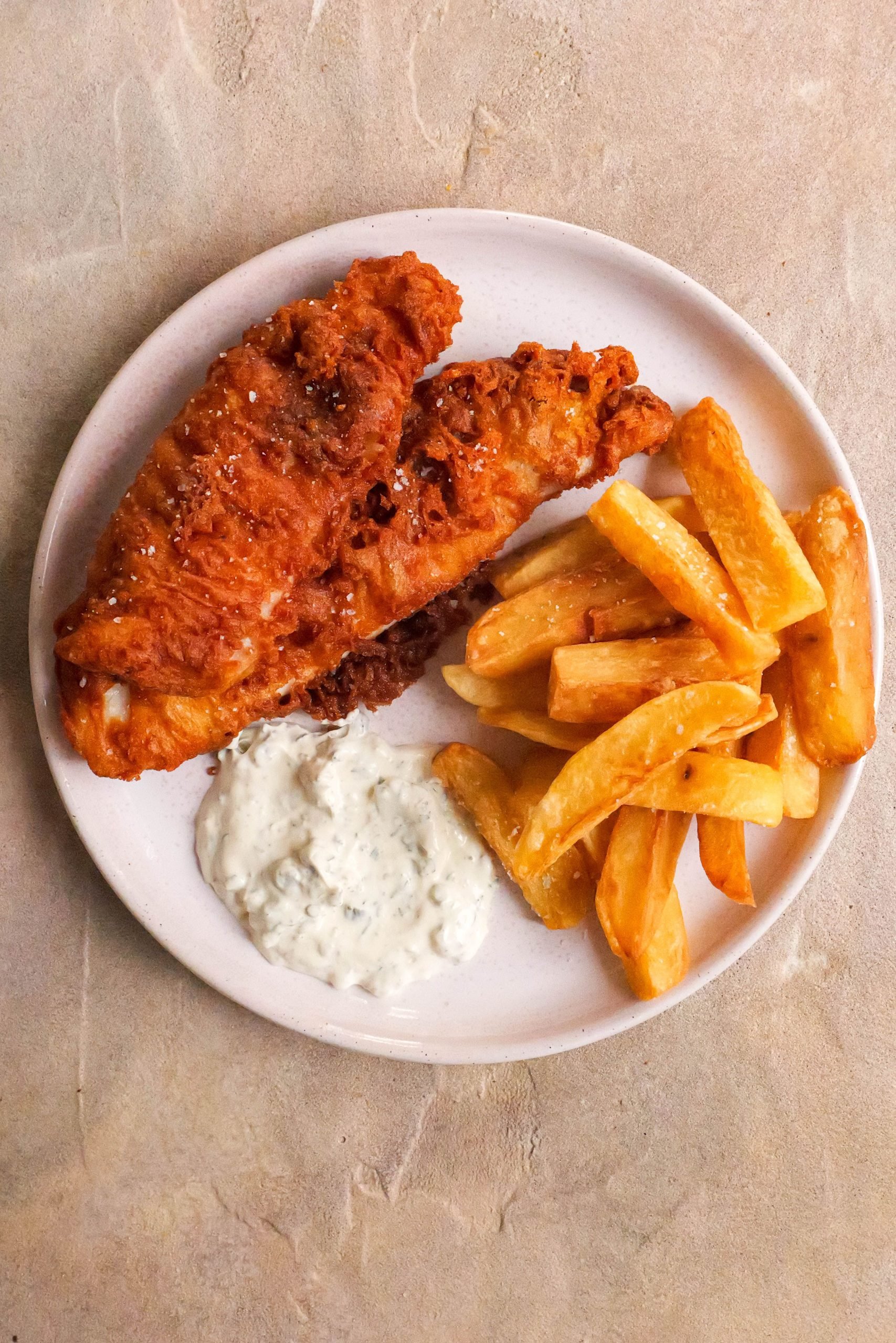 Traditional Homemade British Beer Battered Fish and Chips, with a classic  easy batter recipe