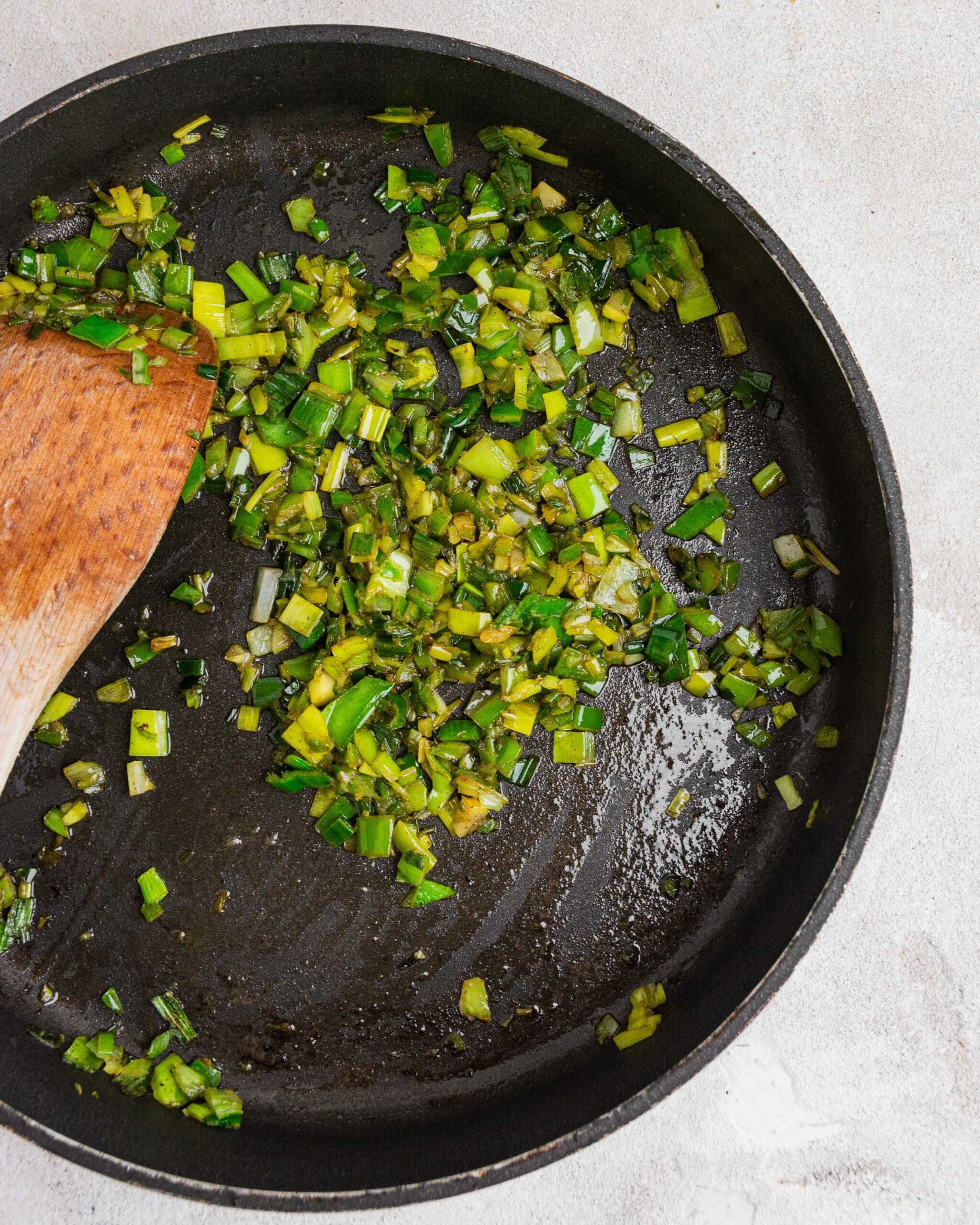 leek tops fried in pan. 