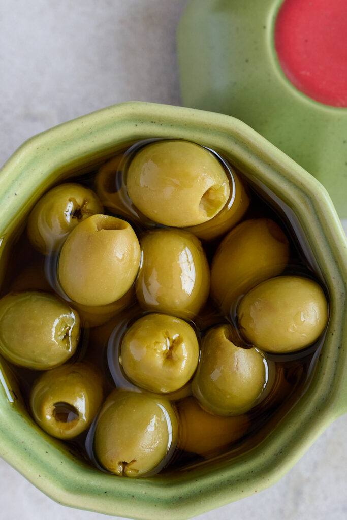 feta stuffed olives. Olive in bowl