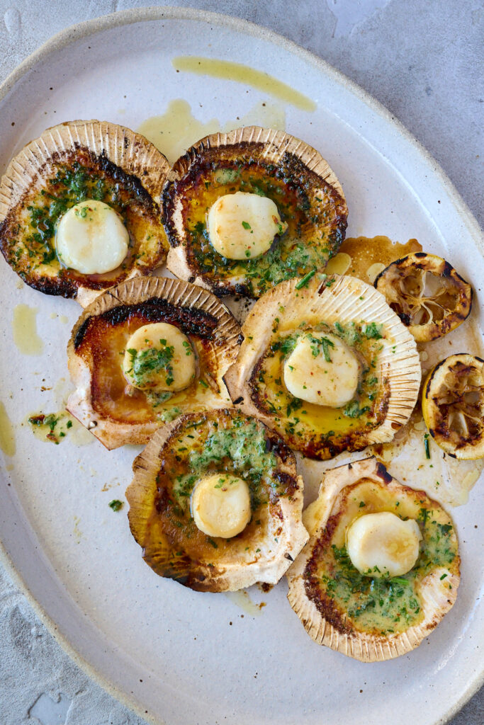 scallops in shell on platter