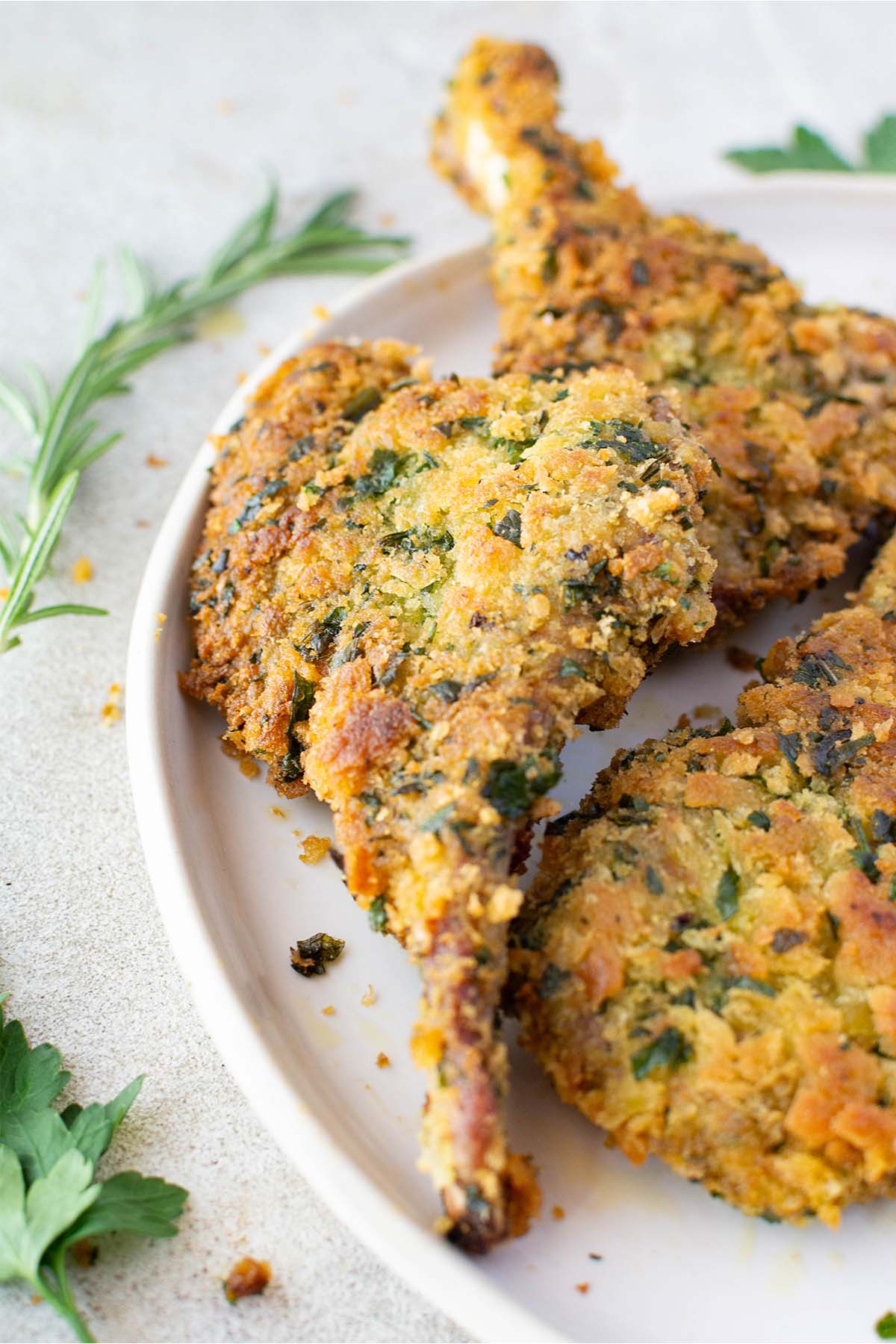 plate of crumbed lamb cutlets.