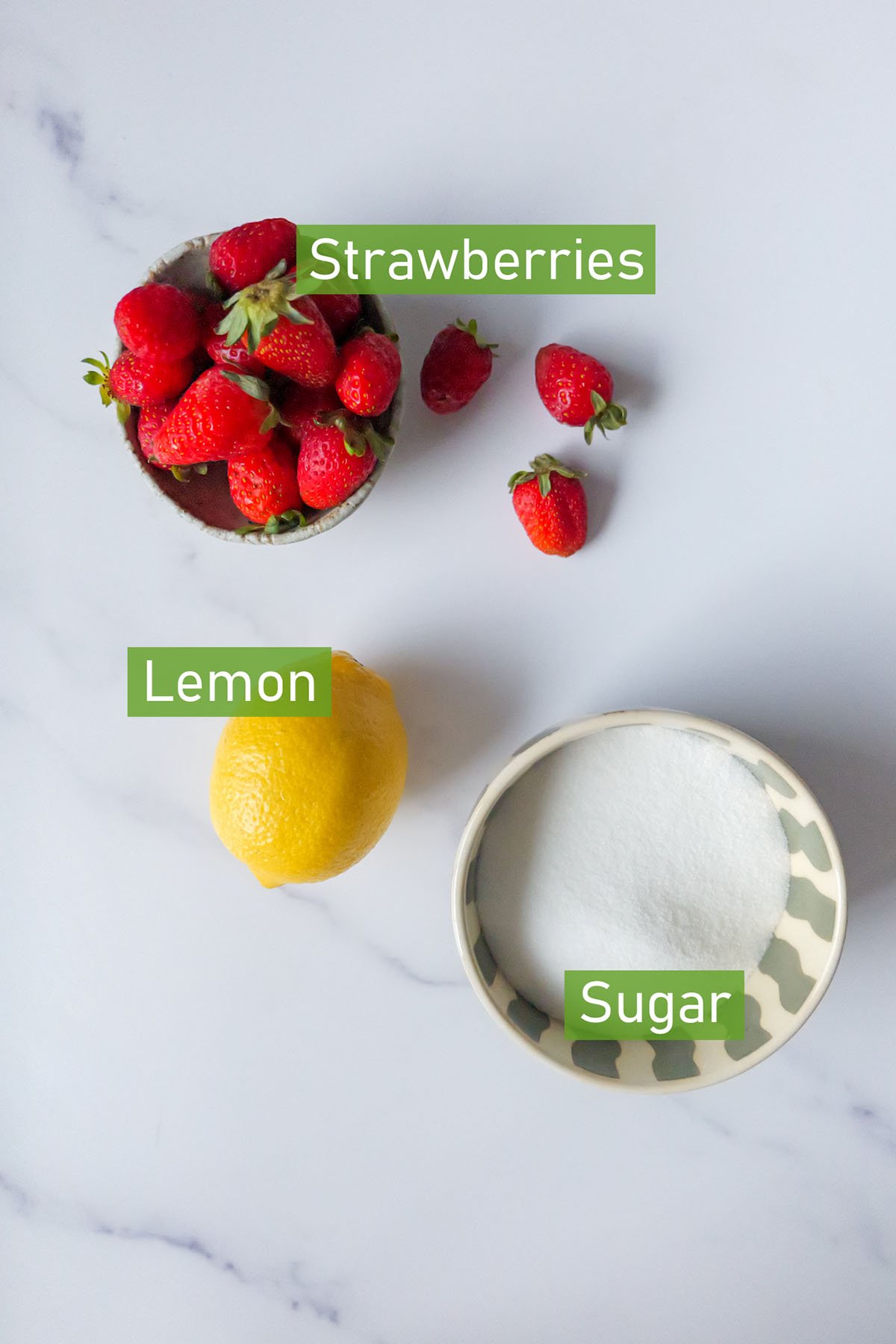 bowls of ingredients for strawberry jam.