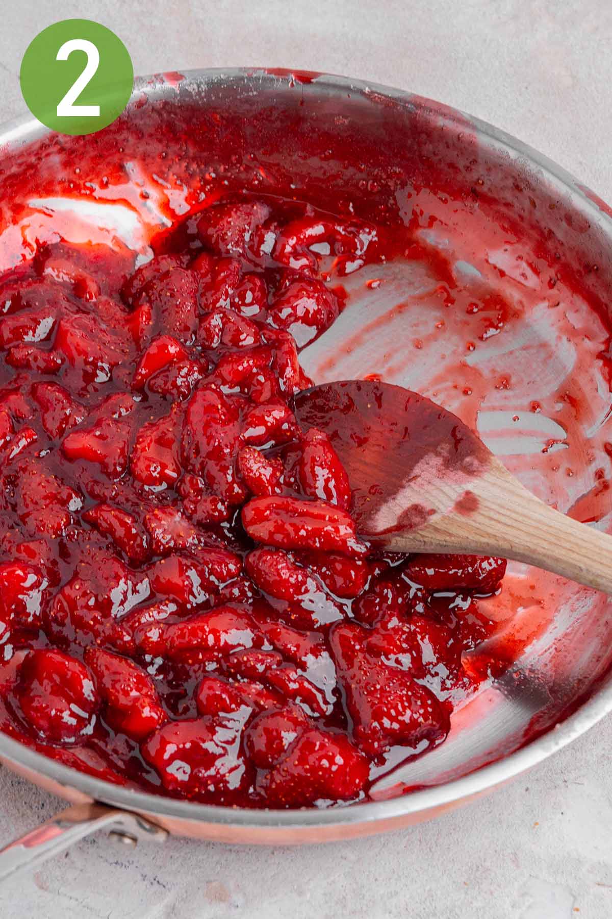cooked strawberry jam in a skillet.