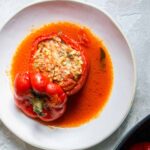 stuffed bell pepper on a white plate.