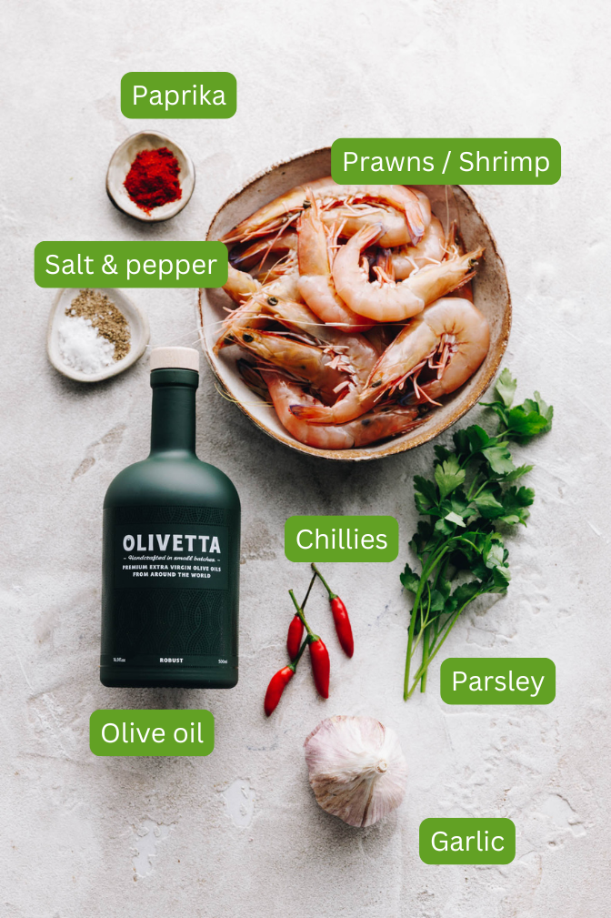 Ingredients for Spanish Garlic Shrimp (Prawns) - Gambas al Ajillo including prawns, salt and pepper, paprika, parsle, chillies, olive oil, garlic