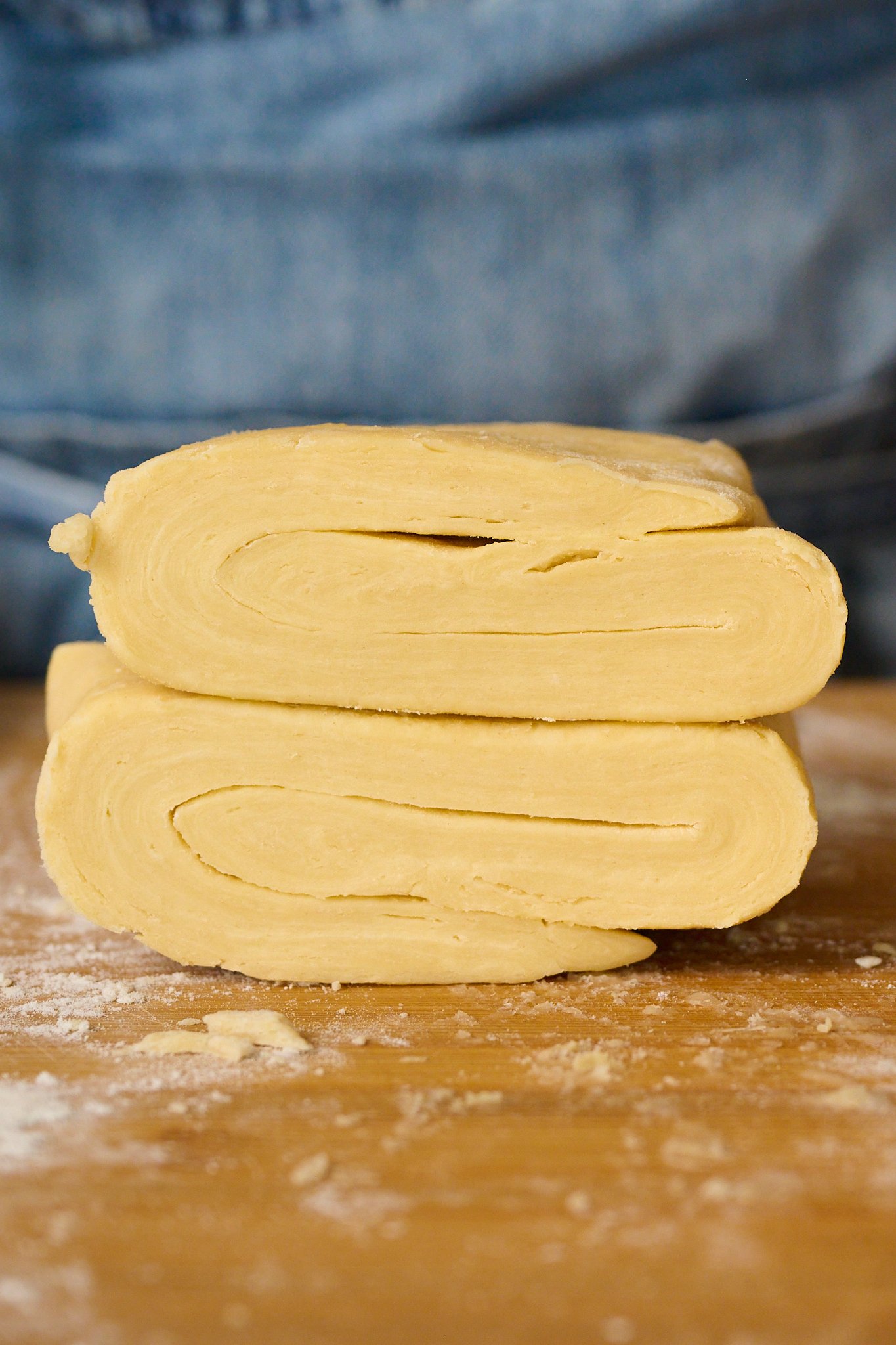 puff pastry is cut in half showing lots of layers