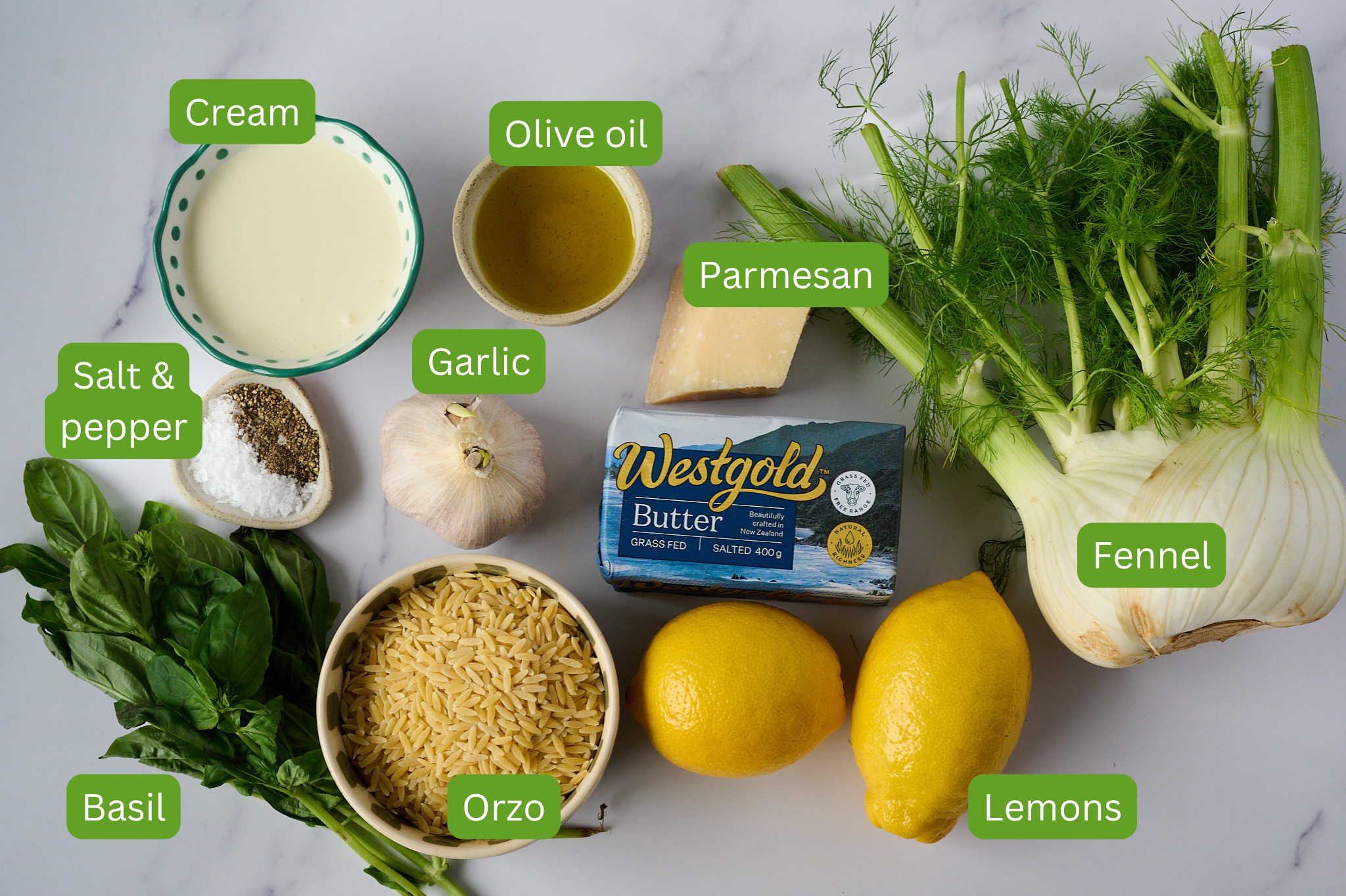 ingredients for Caramelized Fennel One Pot Orzo Pasta are shown. These include lemons, orzo, basil, fennel, butter, salt and pepper, olive oil, garlic and cream