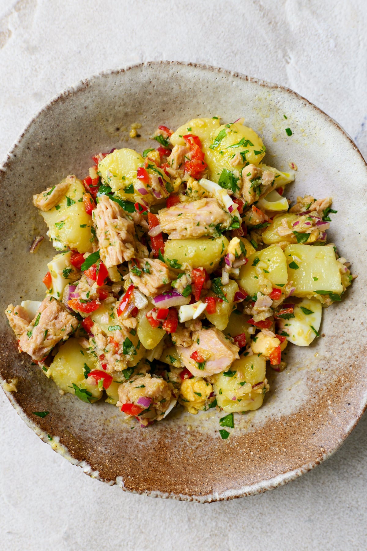 Spanish potato salad in large bowl.
